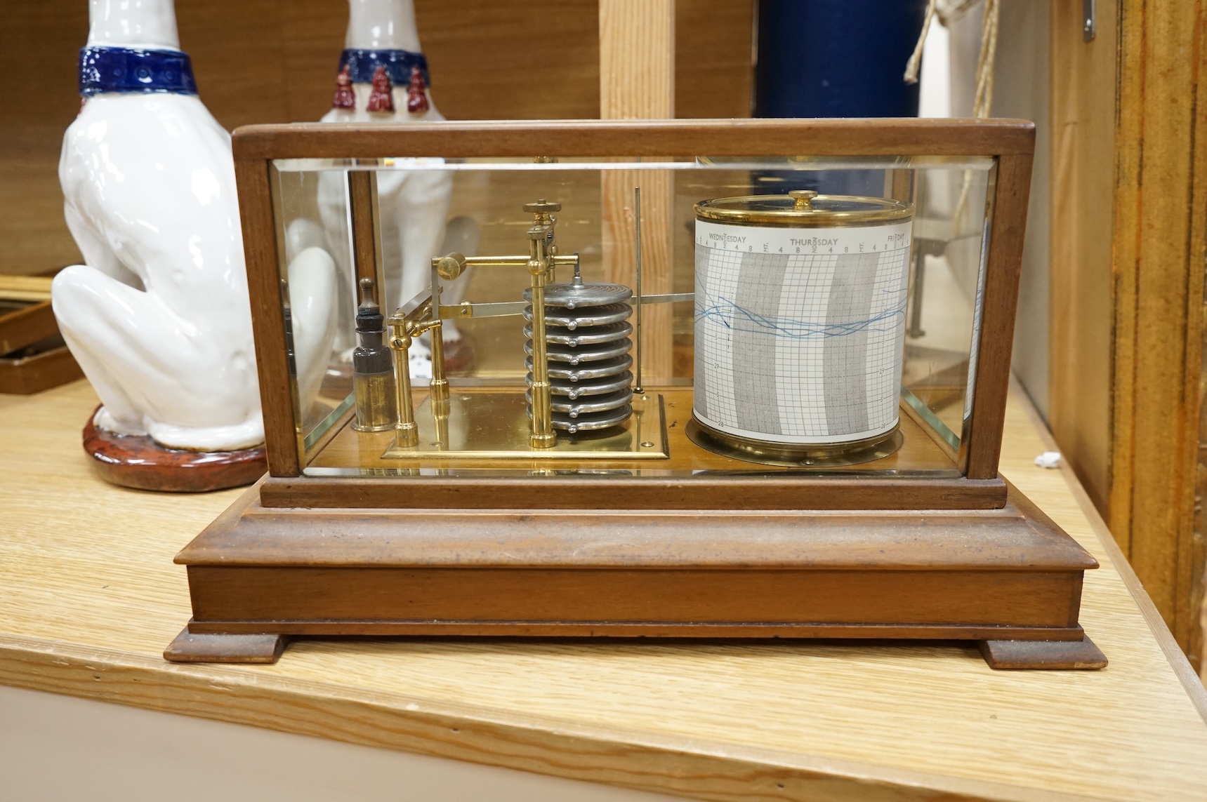 An early 20th century oak cased barograph by Finnigans Ltd., Manchester & Liverpool, with integral drawer underneath containing spare papers